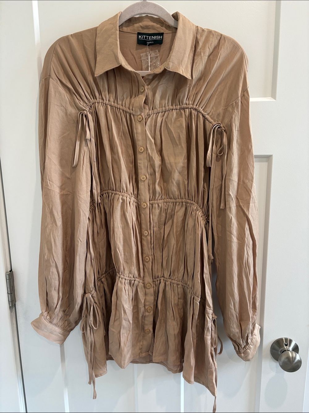 Kittenish Tan Button-Front Tiered Blouse